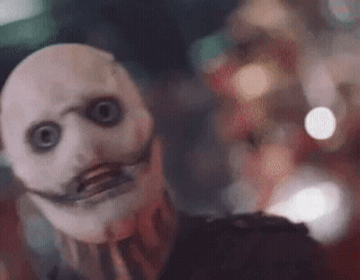 Person In Scary Mask With Long Mustache GIF