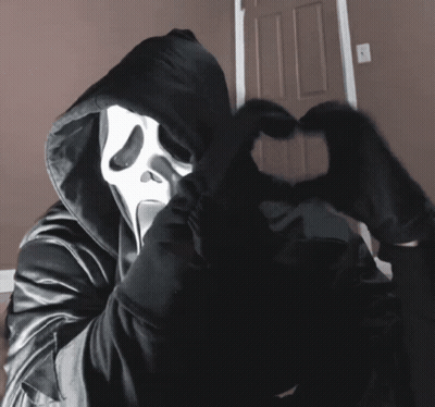 Person In Scream Mask And Black Hood GIF