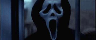 Person In Scream Mask Behind Window GIF