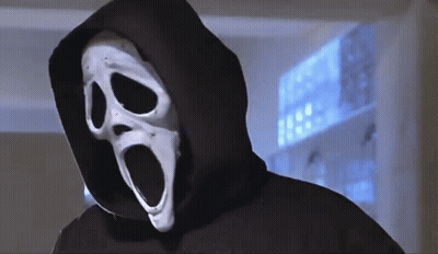 Person In Scream Mask Behind Window GIF