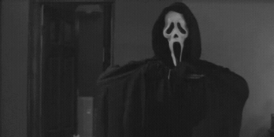 Person In Scream Mask Holding Knife GIF