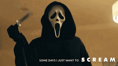 Person In Scream Mask Holding Knife GIF