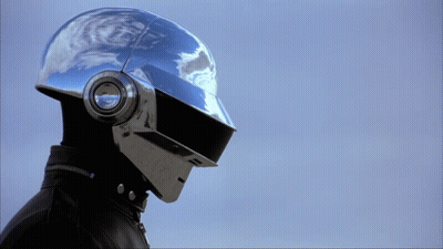 Person In Silver Helmet With Headphones GIF