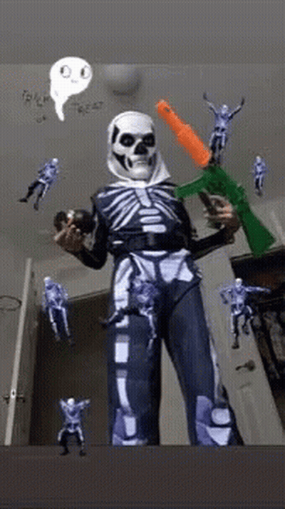 Person In Skeleton Costume Holding Gun And Toy GIF