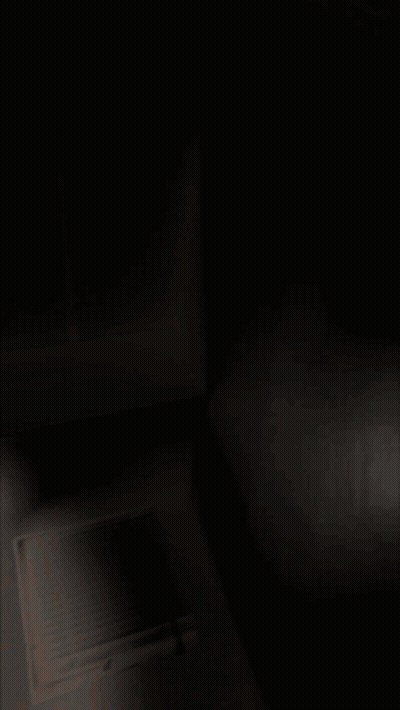 Person In Skeleton Mask Looking At Camera GIF