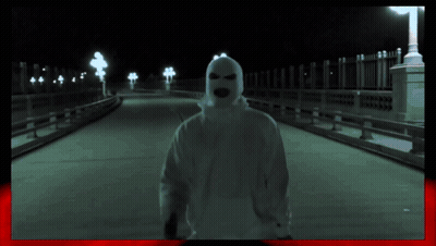 Person In Ski Mask On Bridge GIF