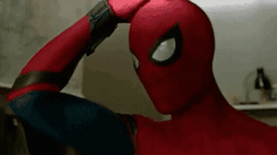 Person In Spiderman Costume Holding Hand To Head GIF
