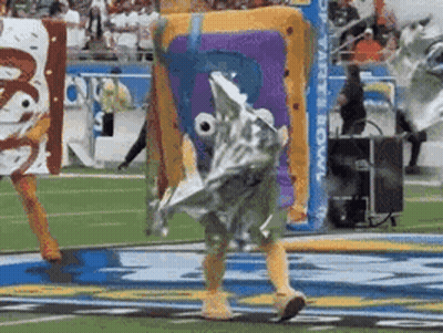 Person In SpongeBob Costume Walking On Field GIF