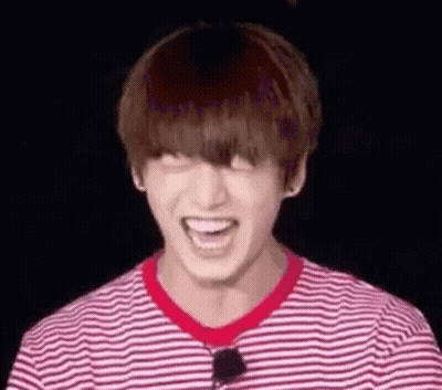 Person In Striped Shirt Laughing GIF