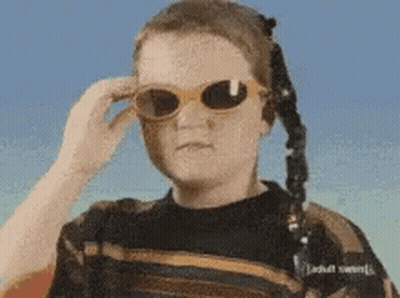 Person In Sunglasses And Adult Swim Sweater GIF