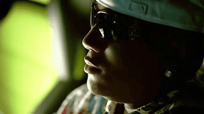 Person In Sunglasses And Baseball Cap With Letter L GIF