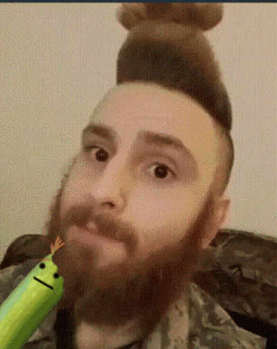 Person In Sunglasses And Beard Dancing In Dark Room GIF