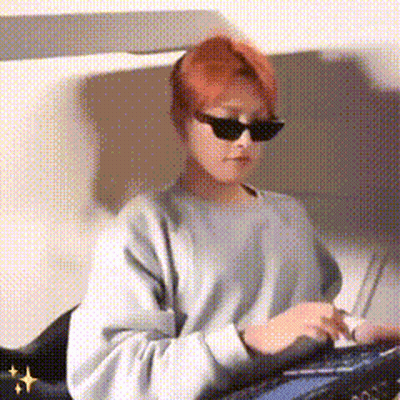 Person In Sunglasses Using Computer GIF