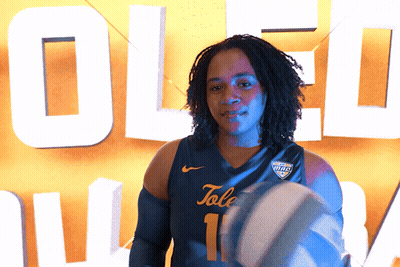 Person In Tale Jersey Holding Basketball GIF