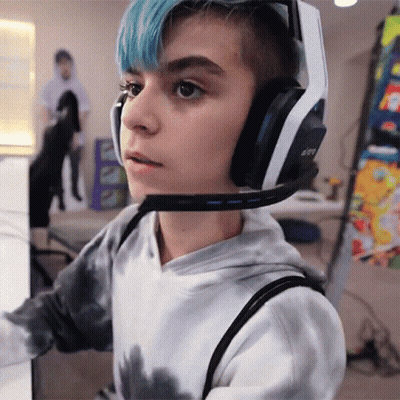 Person In Tie Dye Sweatshirt And Astro Gaming Headphones GIF