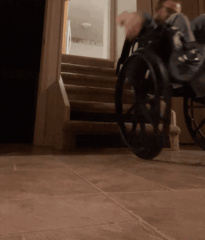 Person In Wheelchair Going Up Stairs GIF