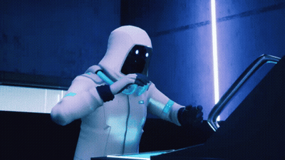 Person In White Hoodie In Front Of Machine GIF