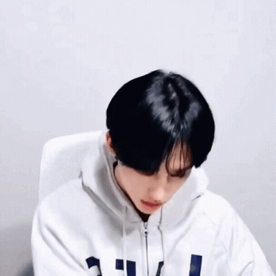 Person In White Hoodie With Black Hair GIF