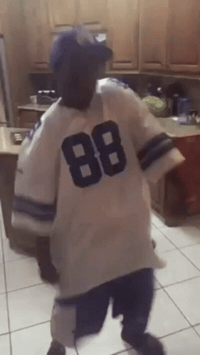 Person In White Jersey 88 Dancing In Kitchen GIF