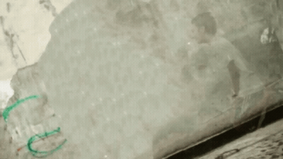Person In White Shirt Green Shorts Flying With Stick GIF