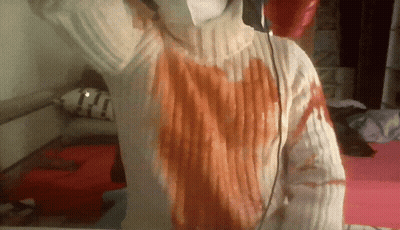 Person In White Sweater With Red Heart GIF