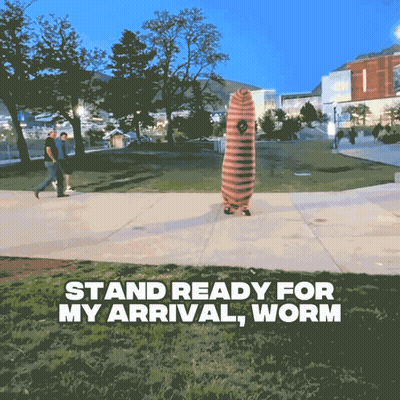 Person In Worm Costume Saying Stand Ready For My Arrival GIF