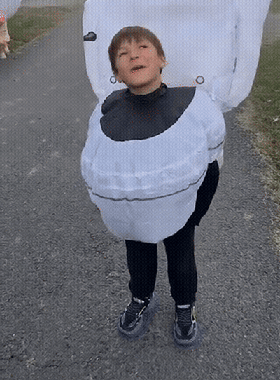 Person In Yellow Hoodie Covering Face GIF