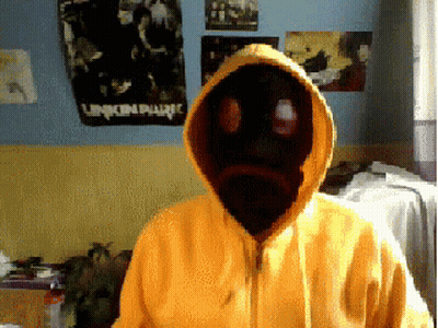 Person In Yellow Hoodie With Black Face And Linkin Park Poster GIF