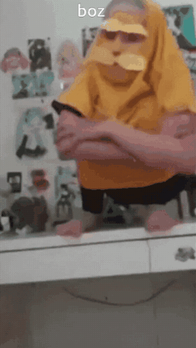 Person In Yellow Shirt And Sunglasses GIF