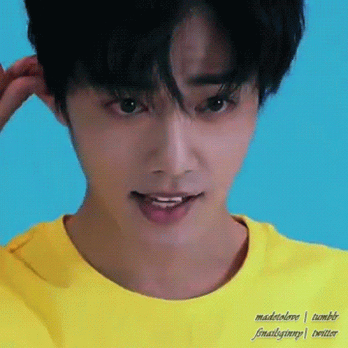 Person In Yellow Shirt Close Up GIF