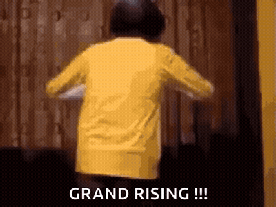 Person In Yellow Shirt Saying Grand Rising GIF