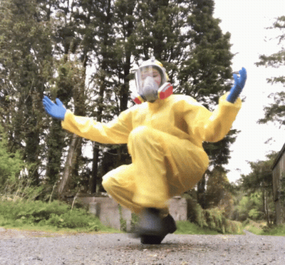 Person In Yellow Suit Jumping In Air GIF