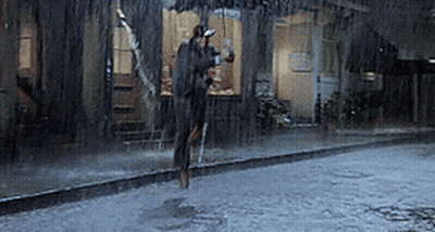 Person Jumping In Rain GIF