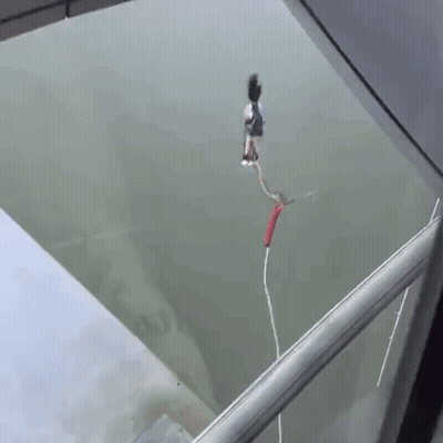 Person Jumping Off Balcony Into Water GIF