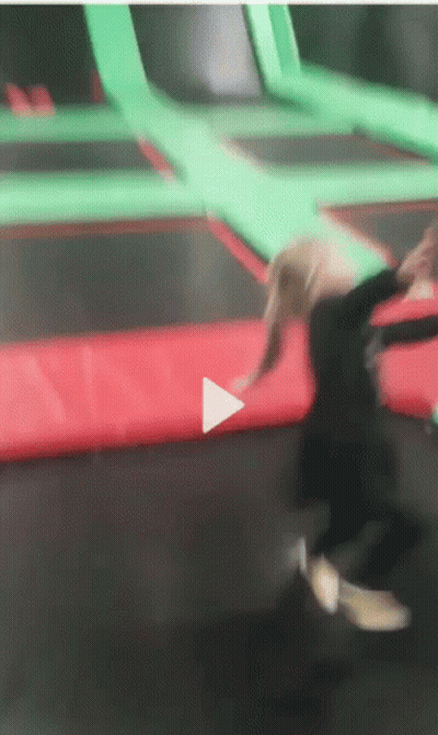 Person Jumping On Trampoline GIF