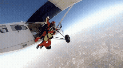 Person Jumping Out Of Airplane With Number 17 GIF