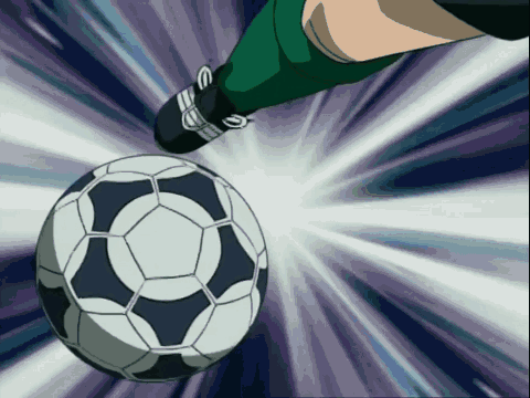Person Kicking Soccer Ball With Letter E On Shoes GIF