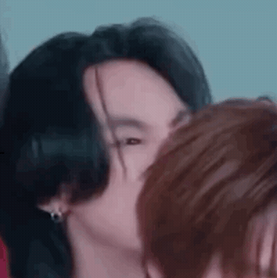 Person Kissing Someone's Cheek GIF