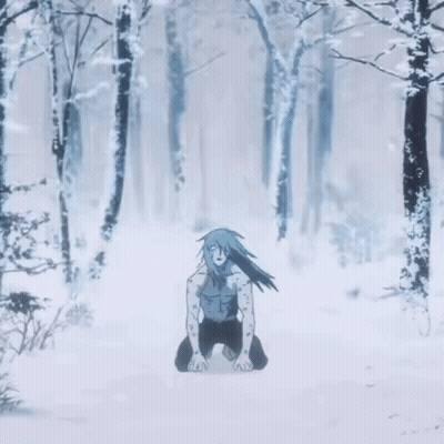 Person Kneeling In Snow In Forest GIF