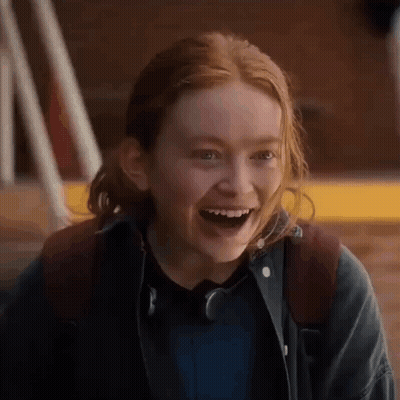 Person Laughing With Mouth Open And Backpack GIF