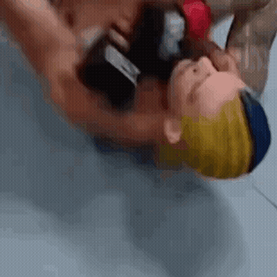 Person Laying Head On Another's Chest GIF