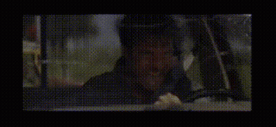 Person Laying On Bed In Dark GIF