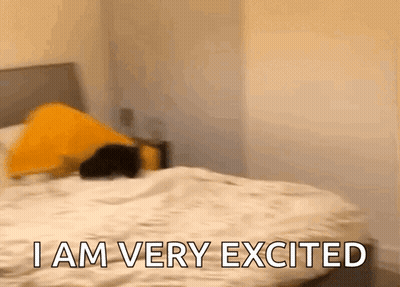 Person Laying On Bed Saying I Am Very Excited GIF
