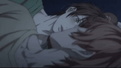 Person Laying On Bed With Blue Blanket GIF