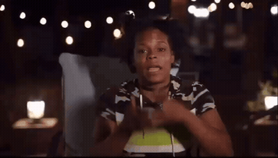 Person Laying On Bed With Pillow At Night GIF