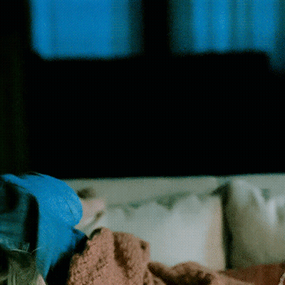 Person Laying On Couch With Blanket GIF