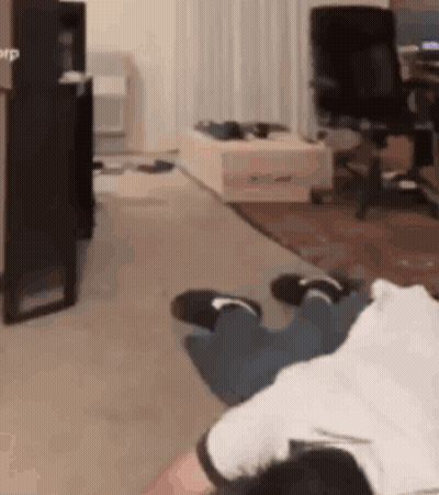 Person Laying On Floor Feet Up GIF