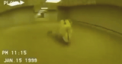 Person Laying On Floor In Yellow Room GIF