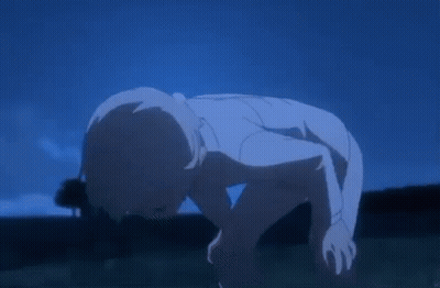 Person Laying On Ground In Field At Night GIF