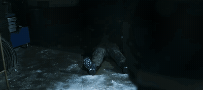 Person Laying On Ground With Gun On Knee GIF
